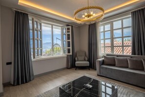 Premium Suite, 2 Bedrooms, Balcony, Sea View | Living area | TV - Royal Hayat Hotel (Antalya)