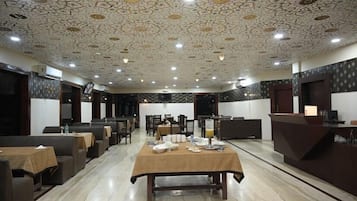 Breakfast, lunch, dinner served; Indian cuisine, pool views