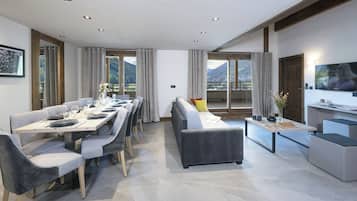 Executive Apartment | Living area | TV