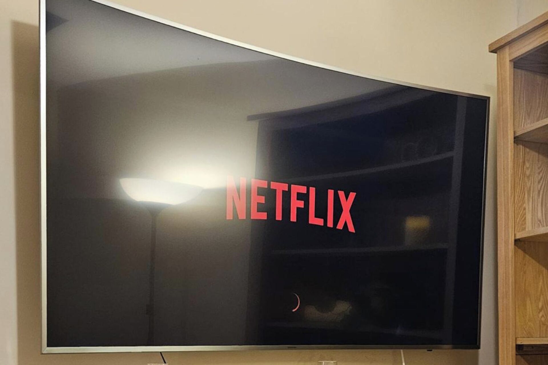 A large flat-screen TV with the Netflix logo displayed on its screen.