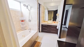 Jetted tub, hair dryer, towels, soap