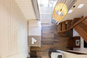 Studio Deluxe Queen com Hidromassagem Coletiva | Living area