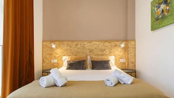 1 habitación, tabla de planchar con plancha, internet y ropa de cama