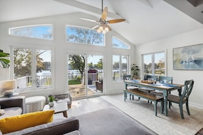 Smart TV, fireplace, books, printers