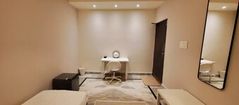Cozy 1-bedroom apartment in charming Manikonda with AC, WiFi, water heater. 