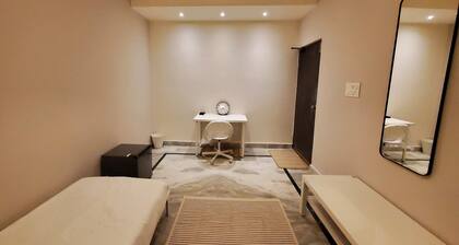 Cozy 1-bedroom apartment in charming Manikonda with AC, WiFi, water heater.