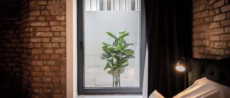 1 غرفة نوم ومكواة/لوح كي وواي فاي وملاءات أسرّة