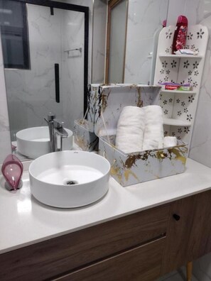Hair dryer, towels, soap, toilet paper