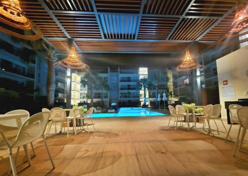 112-c Nuevo, front pool with private garden.