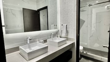 Shower, hair dryer, towels, soap