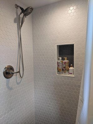 Shower, towels, soap, shampoo