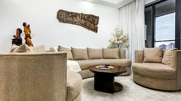 Deluxe Apartment, Balcony, Pool View | Living area
