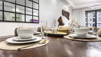 Deluxe Apartment, Balcony, Pool View | Living area | 55-inch plasma TV with digital channels, Netflix, streaming services