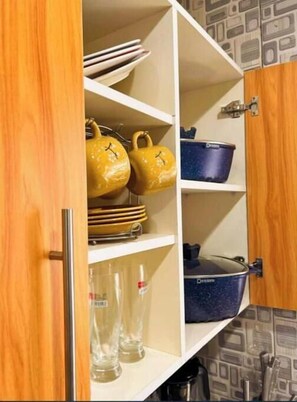 Kitchen essentials at your fingertips, with ample storage for all your needs.