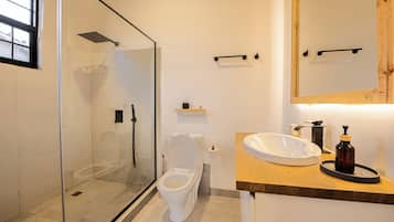 Shower, bathrobes, slippers, towels