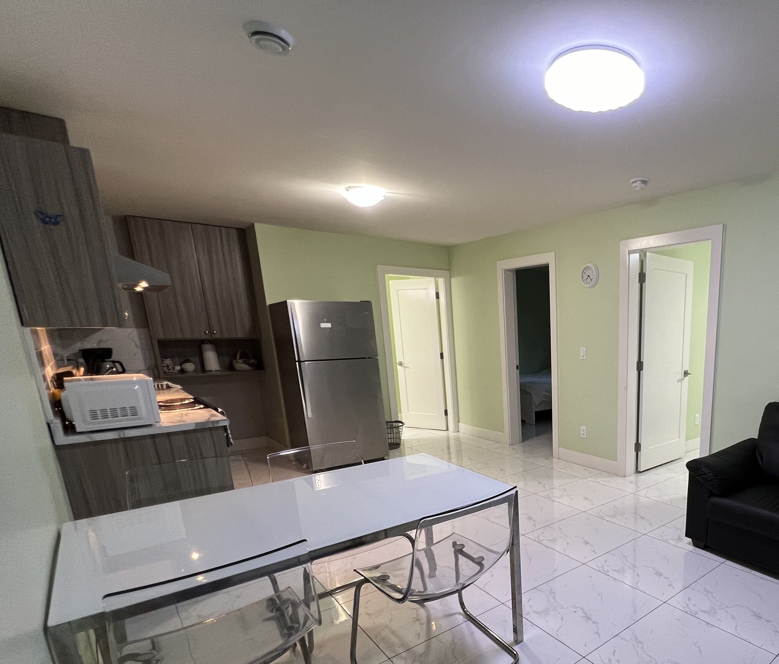 Luxury Suite, 2 Bedrooms, Non Smoking | Living area | 45-inch LED TV with cable channels, heated floors