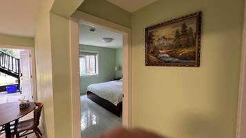 Deluxe Suite | Premium bedding, Select Comfort beds, iron/ironing board, free WiFi