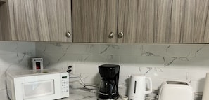 Luxury Suite, 2 Bedrooms, Non Smoking | Private kitchen | Full-size fridge, microwave, coffee/tea maker, electric kettle