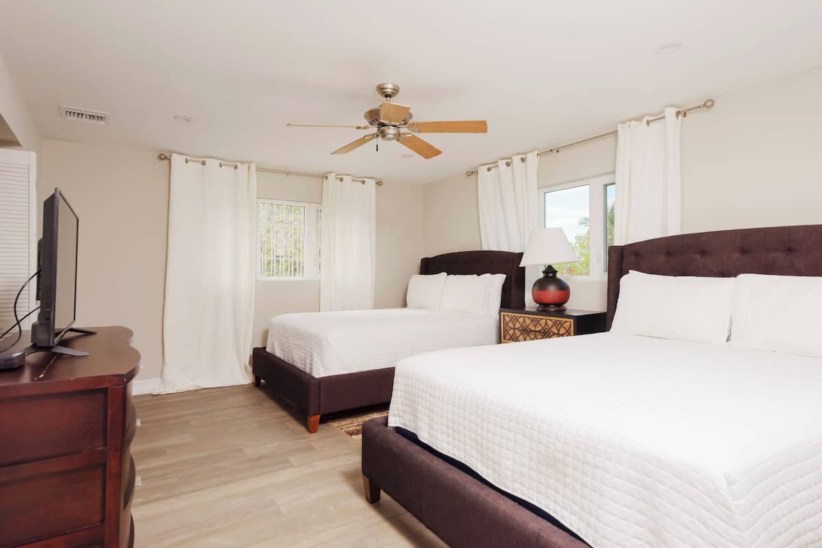 2 bedrooms, laptop workspace, blackout curtains, iron/ironing board