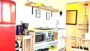 Fridge, microwave, stovetop, coffee/tea maker