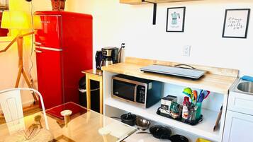 Fridge, microwave, stovetop, coffee/tea maker