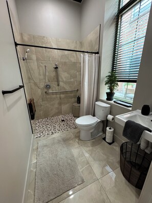 Shower, hair dryer, towels, soap