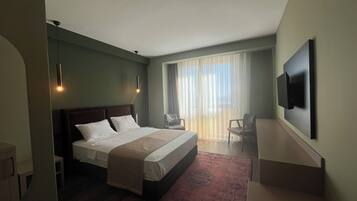 Premium bedding, memory-foam beds, free minibar, in-room safe