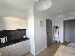 Panorama-lejlighed - 1 soveværelse - balkon - byudsigt | Privat køkken