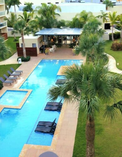 vr207h+c. Lovely apartment with pool view.

