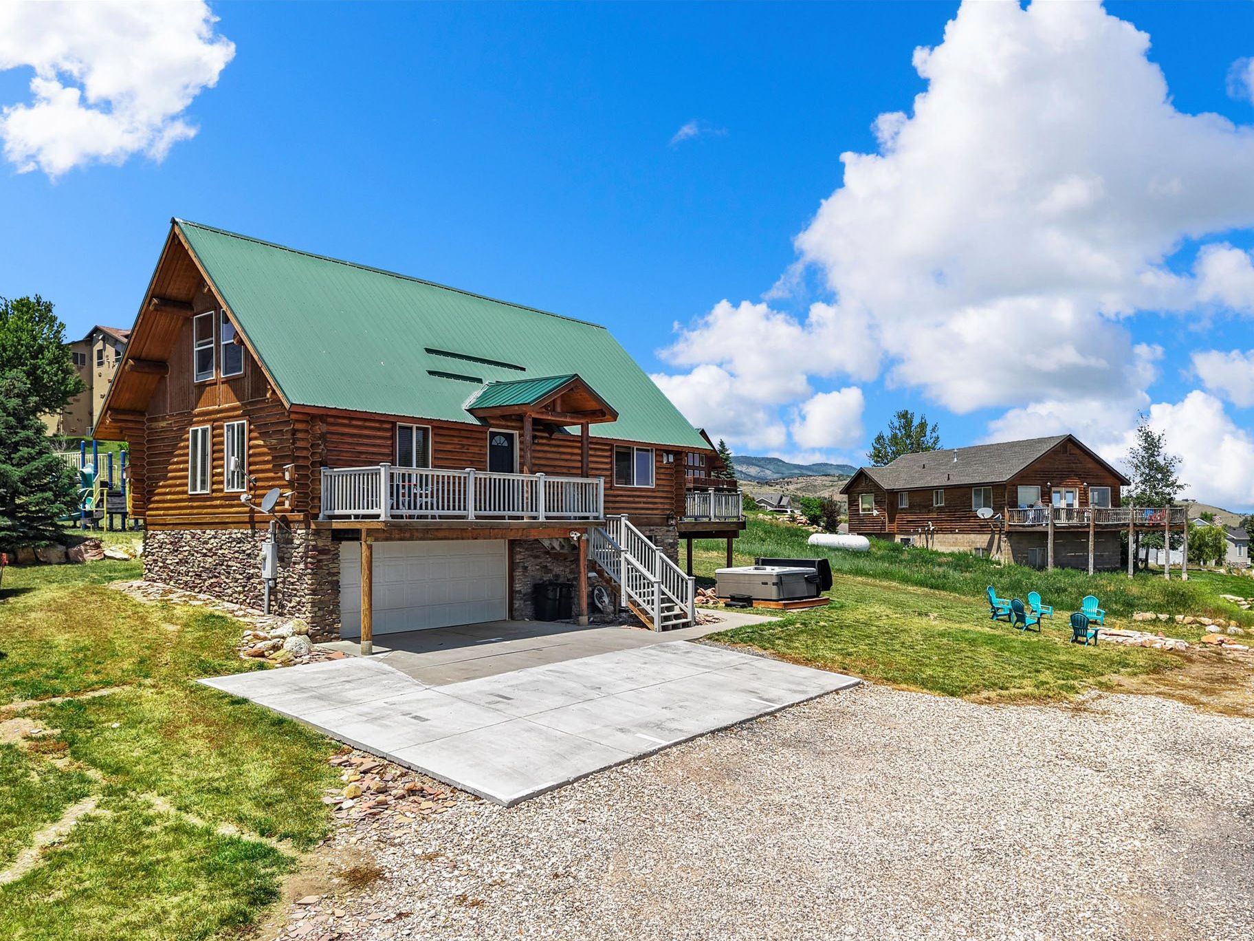 As you roll up the driveway, you’ll be greeted by a charming log cabin, inviting you to create new Bear Lake memories