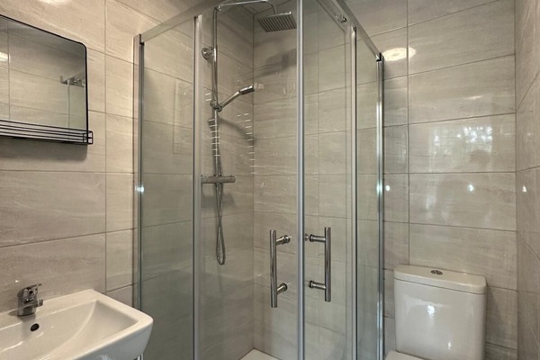 Shower, eco-friendly toiletries, towels, soap