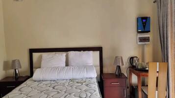 1 chambre, fer et planche Ă repasser, Wi-Fi, draps fournis