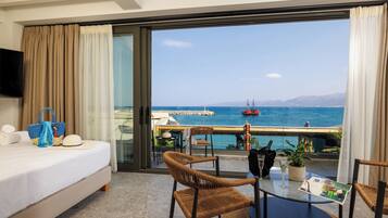 Suite Junior, pemandangan samudra | Kedap suara, setrika/meja setrika, Wi-Fi gratis, dan seprai linen