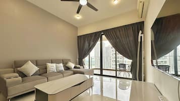 Basic Apartment, 3 Bedrooms, Non Smoking, Balcony | Living area | 55-inch Smart TV with digital channels, Netflix, streaming services
