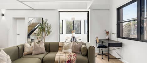 Two Bed Two Bath Apartment | Living area | Flat-screen TV