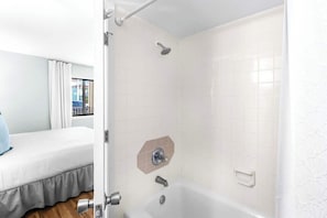 Shower, hair dryer, towels, shampoo