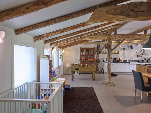 Group farmhouse with garden in wooded area