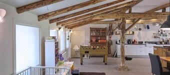 Group farmhouse with garden in wooded area