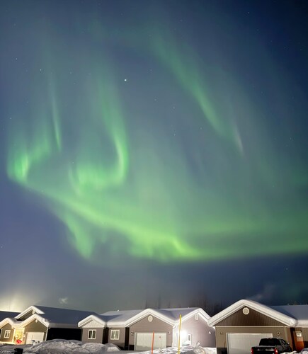 Well-located 3-bedroom home with Aurora viewing and winter garage access.