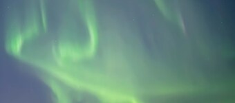 Well-located 3-bedroom home with Aurora viewing and winter garage access.