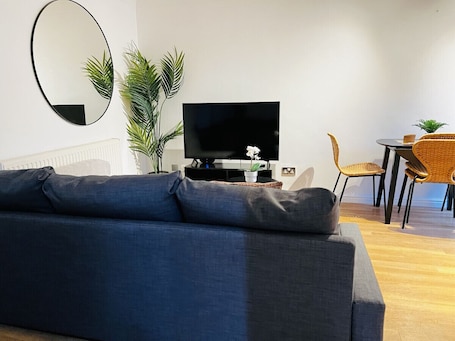 Smart TV, books. Irene Suite By Koya Homes