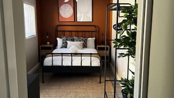 2 bedrooms, desk, iron/ironing board, travel crib