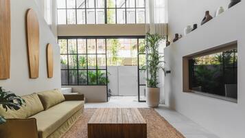 Deluxe Villa, 1 Bedroom, Non Smoking, Air conditioning | Living area | 65-inch Smart TV with digital channels