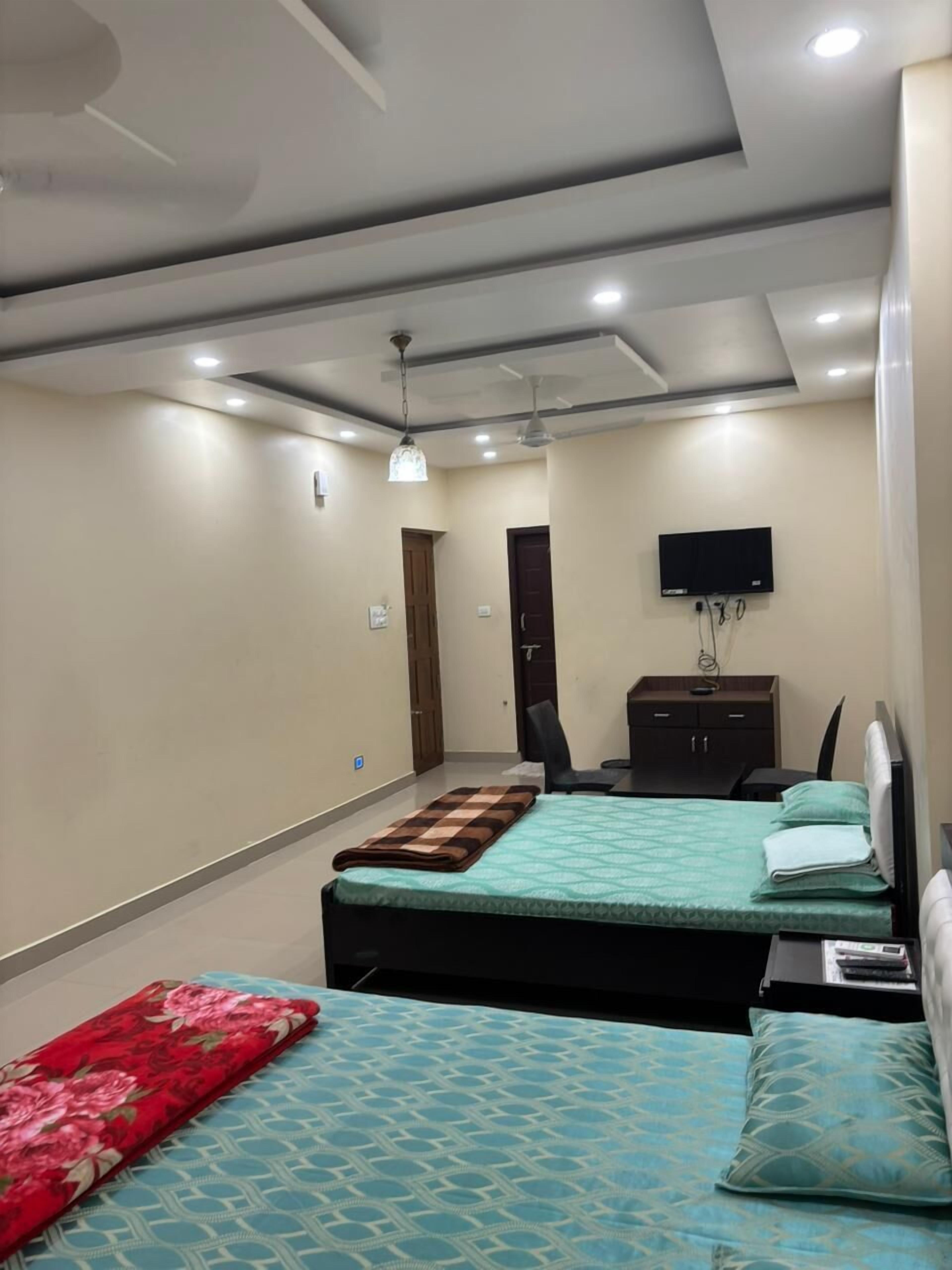 Family Room | Pillowtop beds, desk, blackout drapes, free WiFi