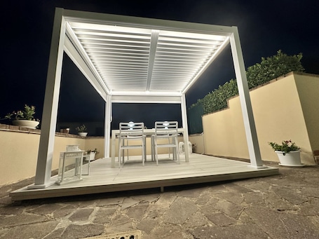 Terrace/patio. Villa Cattleya