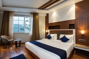 Tabla de planchar con plancha, wifi gratis y ropa de cama