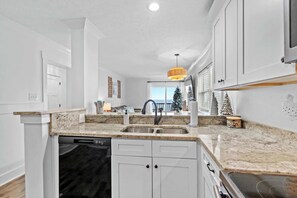 Fridge, microwave, oven, stovetop - Palmwood Villas - New "Our Place, By the Sea" (North Myrtle Beach)