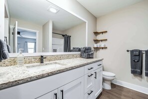 Shower, hair dryer, towels - Serene 2-Bedroom Condo in Traverse City (Williamsburg)