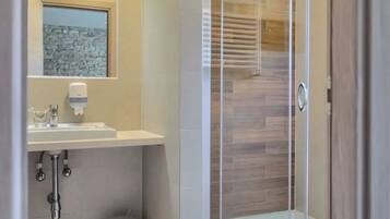 Shower, towels, toilet paper