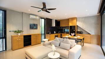 Design Villa, 1 Bedroom, Garden View | Living area | Flat-screen TV